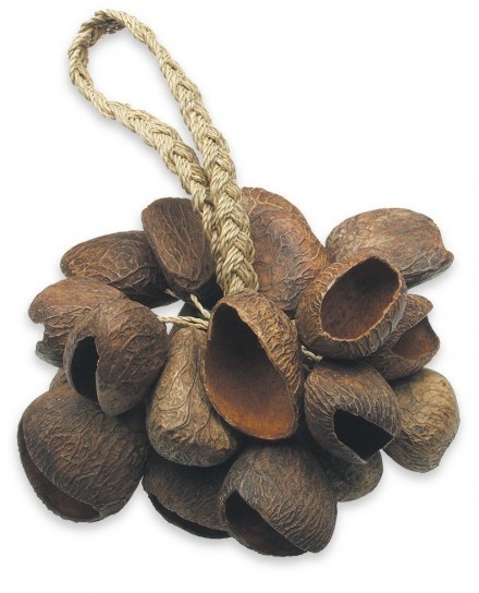 Tap into the rhythms of the Earth with this cluster of dark-hued seed pods harvested from the sweet chestnut plant, which is common throughout southern Europe, Asia Minor, and other temperate regions. Grasp the thick, woven hemp handle or drape it over a 
